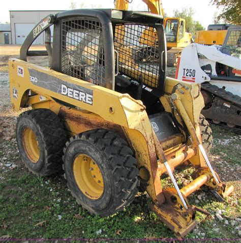 john deere skid steer rims and tires|jd 320 skid steer.